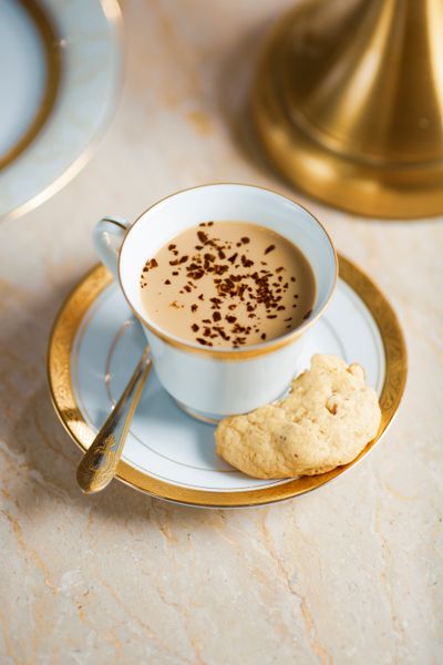 Coffee cup and cookie